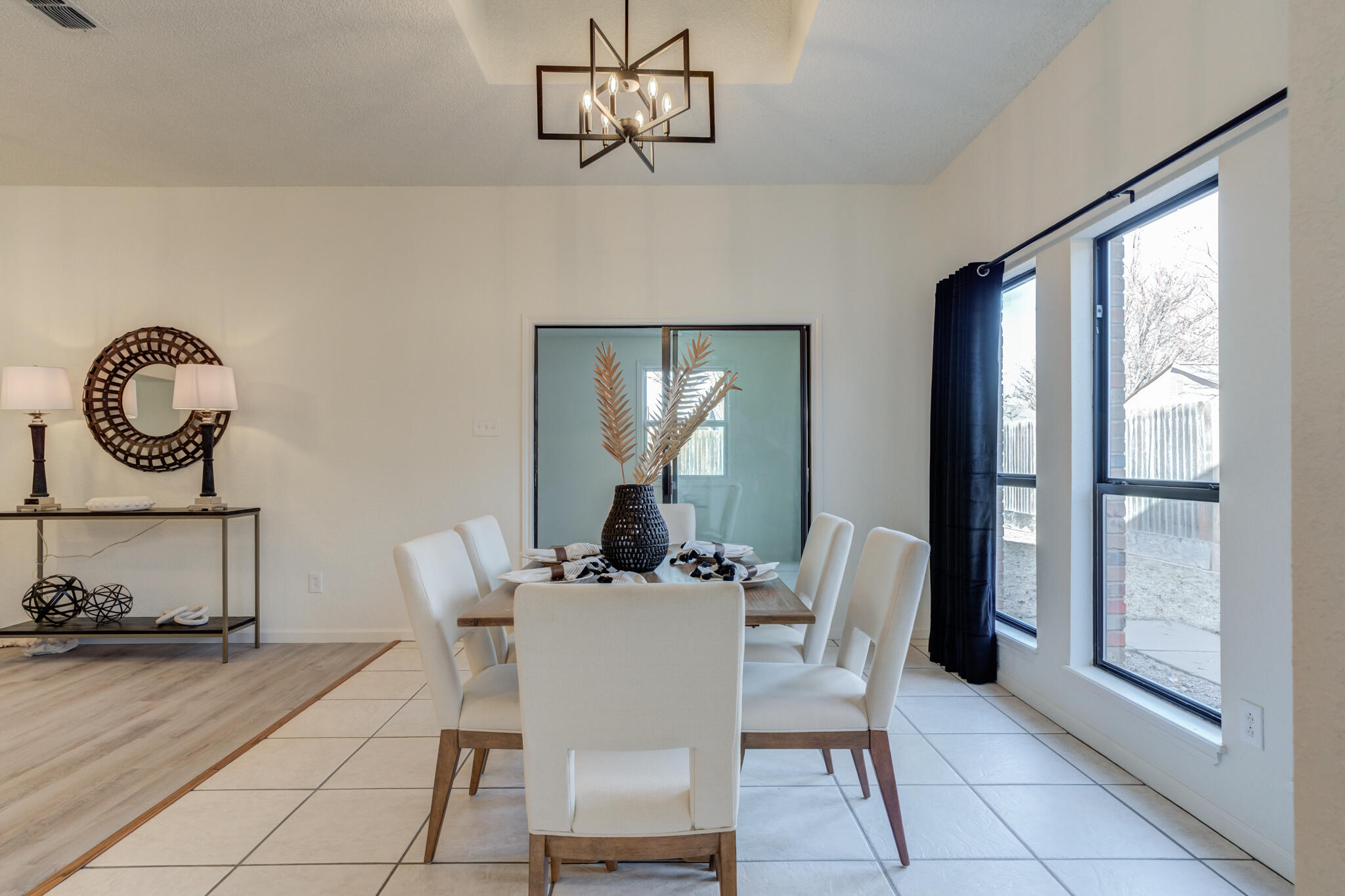 3602 101st Street Lubbock, TX 79423 - Photo 15 of 51 a dining room with furniture and window