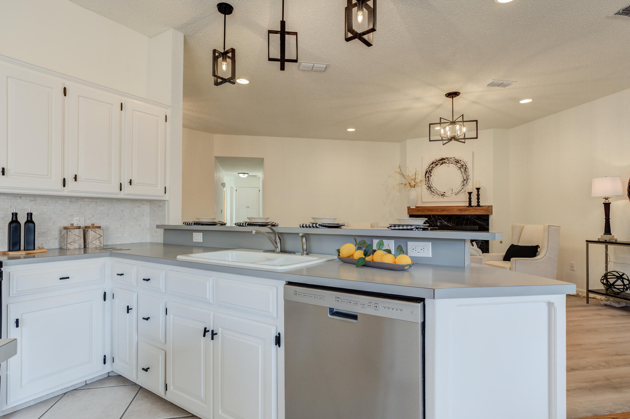 3602 101st Street Lubbock, TX 79423 - Photo 23 of 51 a kitchen with stainless steel appliances granite countertop a sink and cabinets