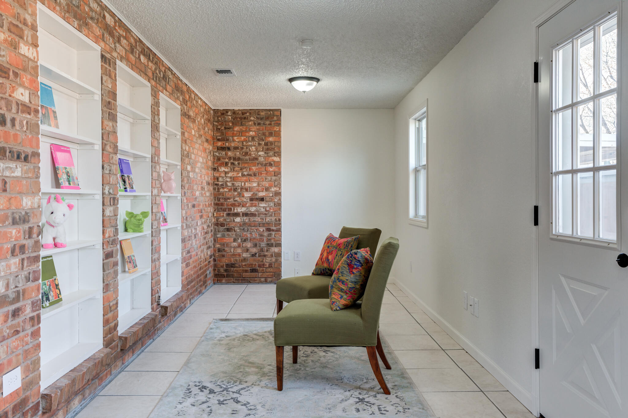 3602 101st Street Lubbock, TX 79423 - Photo 25 of 51 a view of a livingroom with furniture and a window