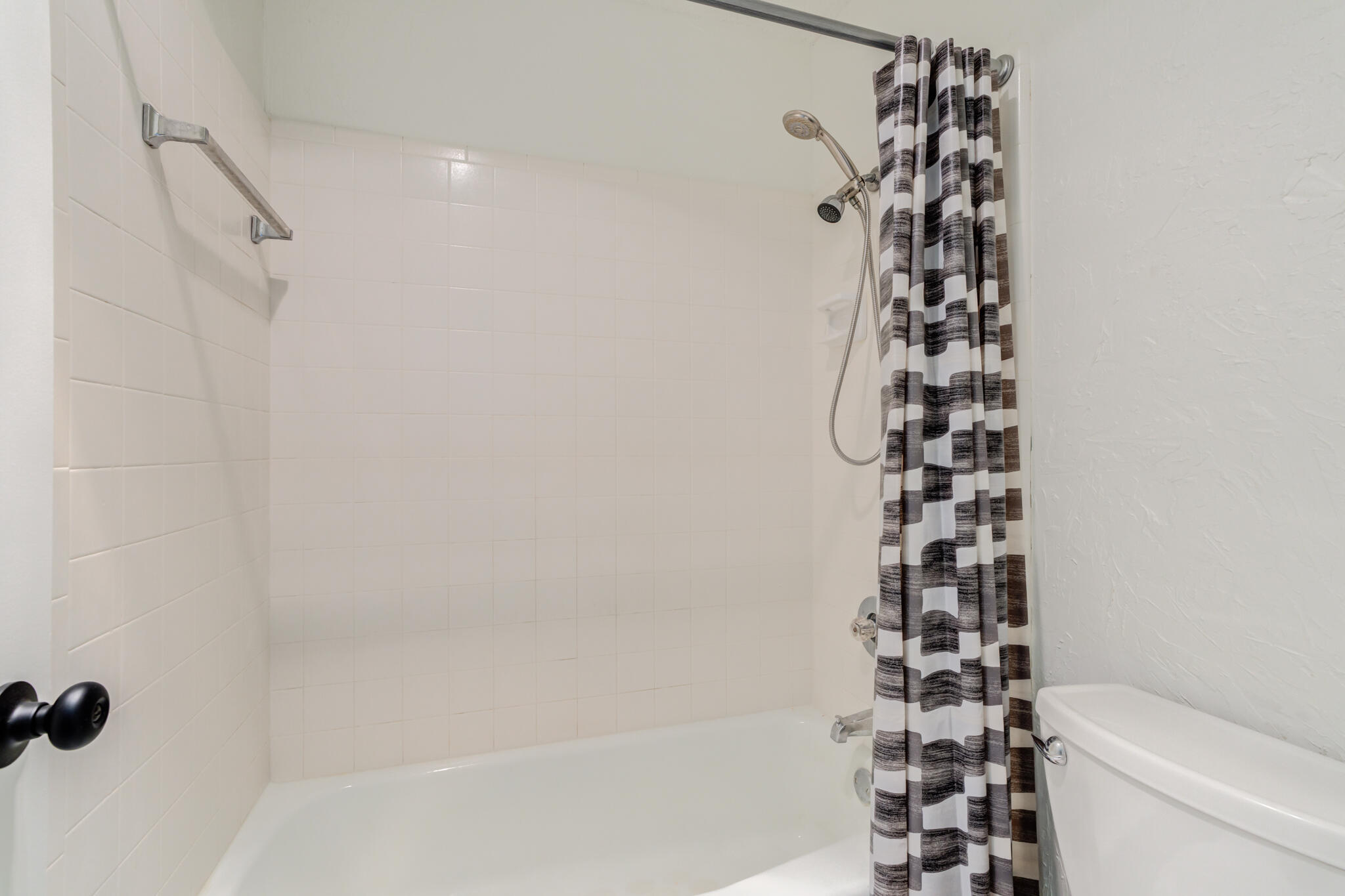 3602 101st Street Lubbock, TX 79423 - Photo 39 of 51 a bathroom with a shower toilet and sink