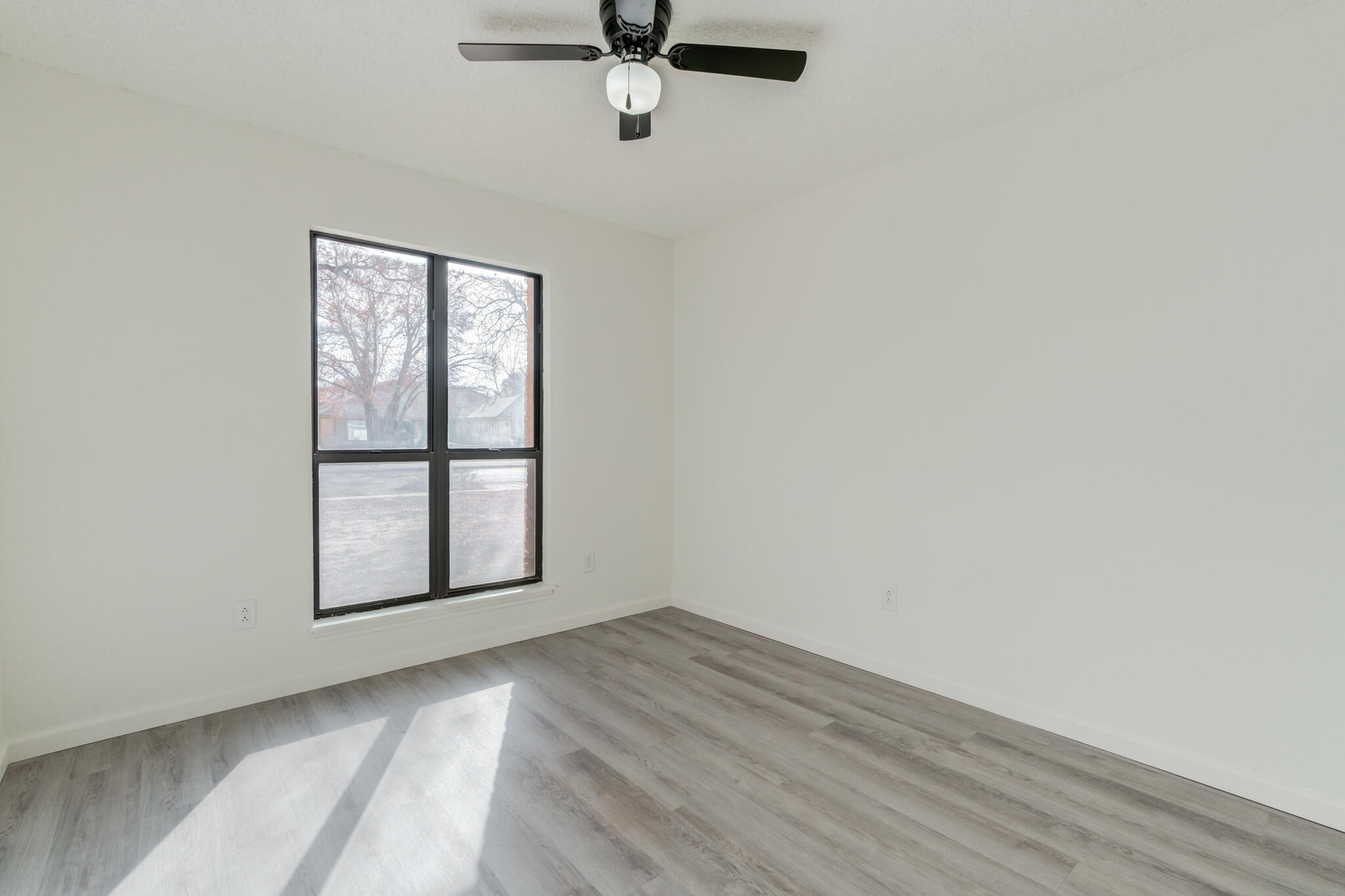 3602 101st Street Lubbock, TX 79423 - Photo 40 of 51 an empty room with a window
