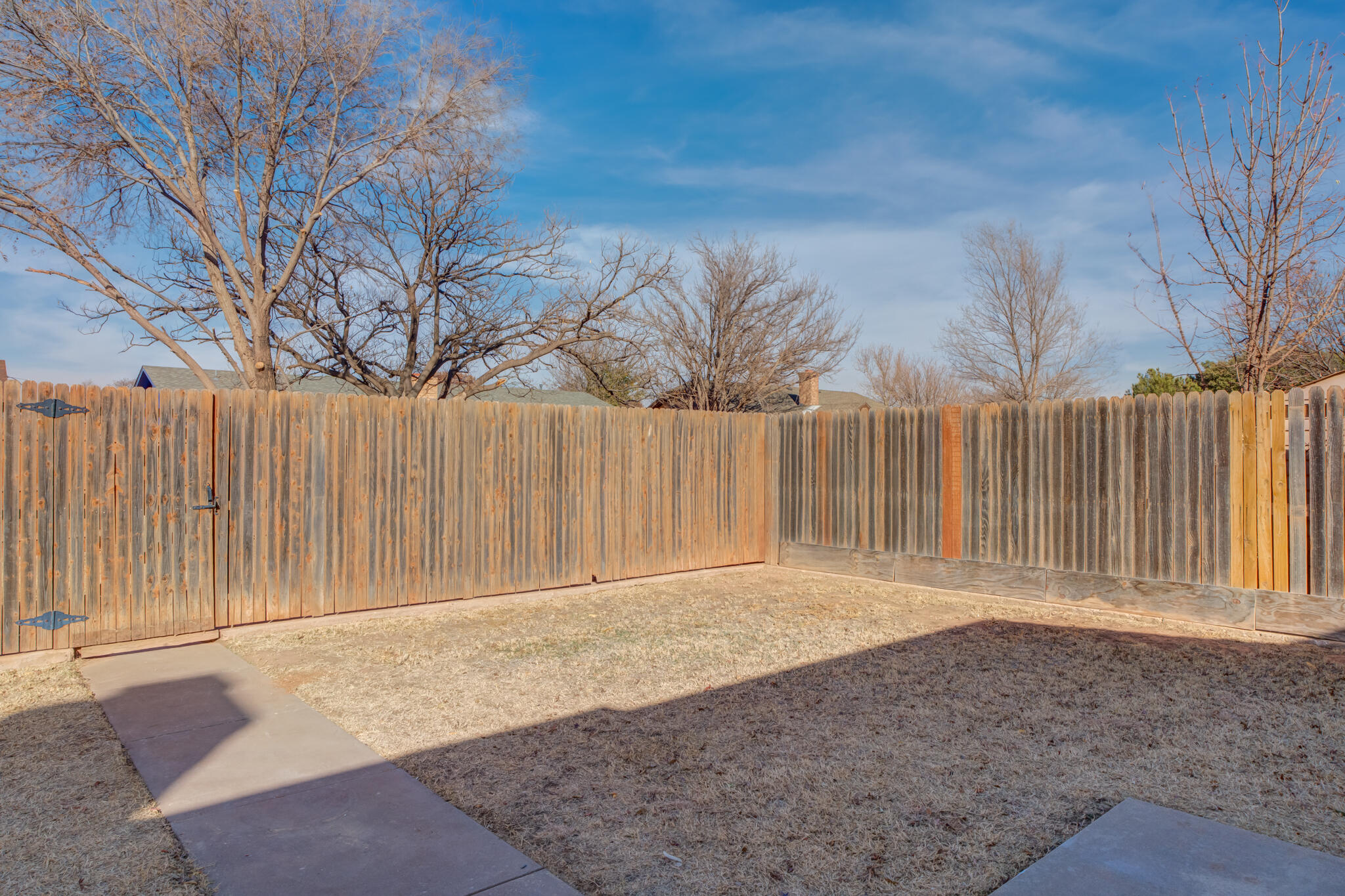 3602 101st Street Lubbock, TX 79423 - Photo 44 of 51 a backyard of a house
