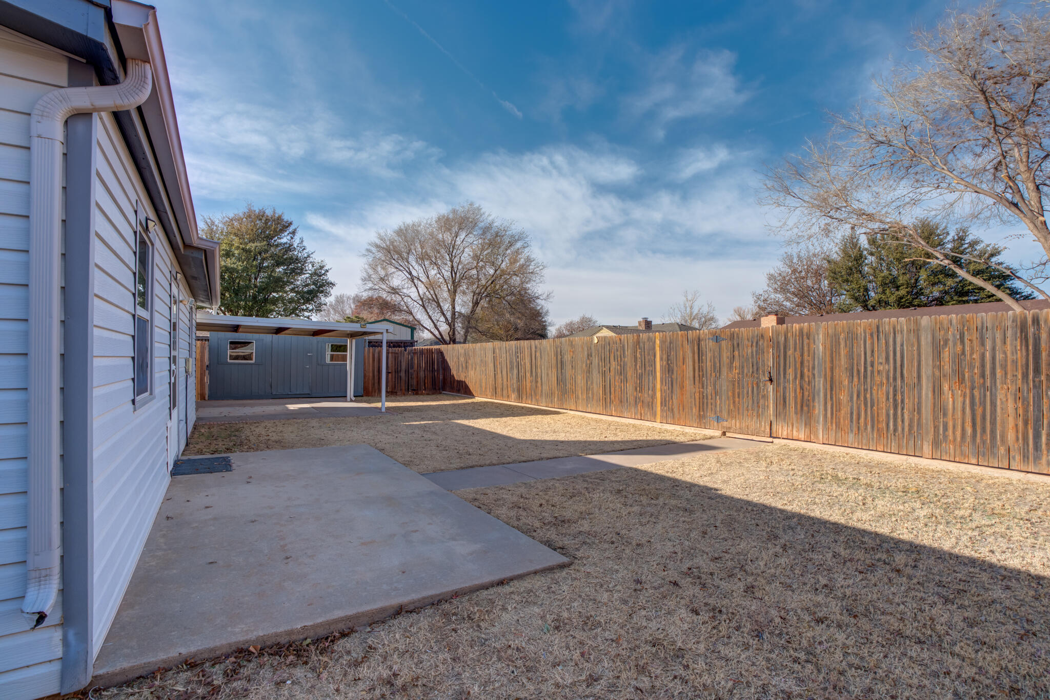 3602 101st Street Lubbock, TX 79423 - Photo 46 of 51 a backyard of a house