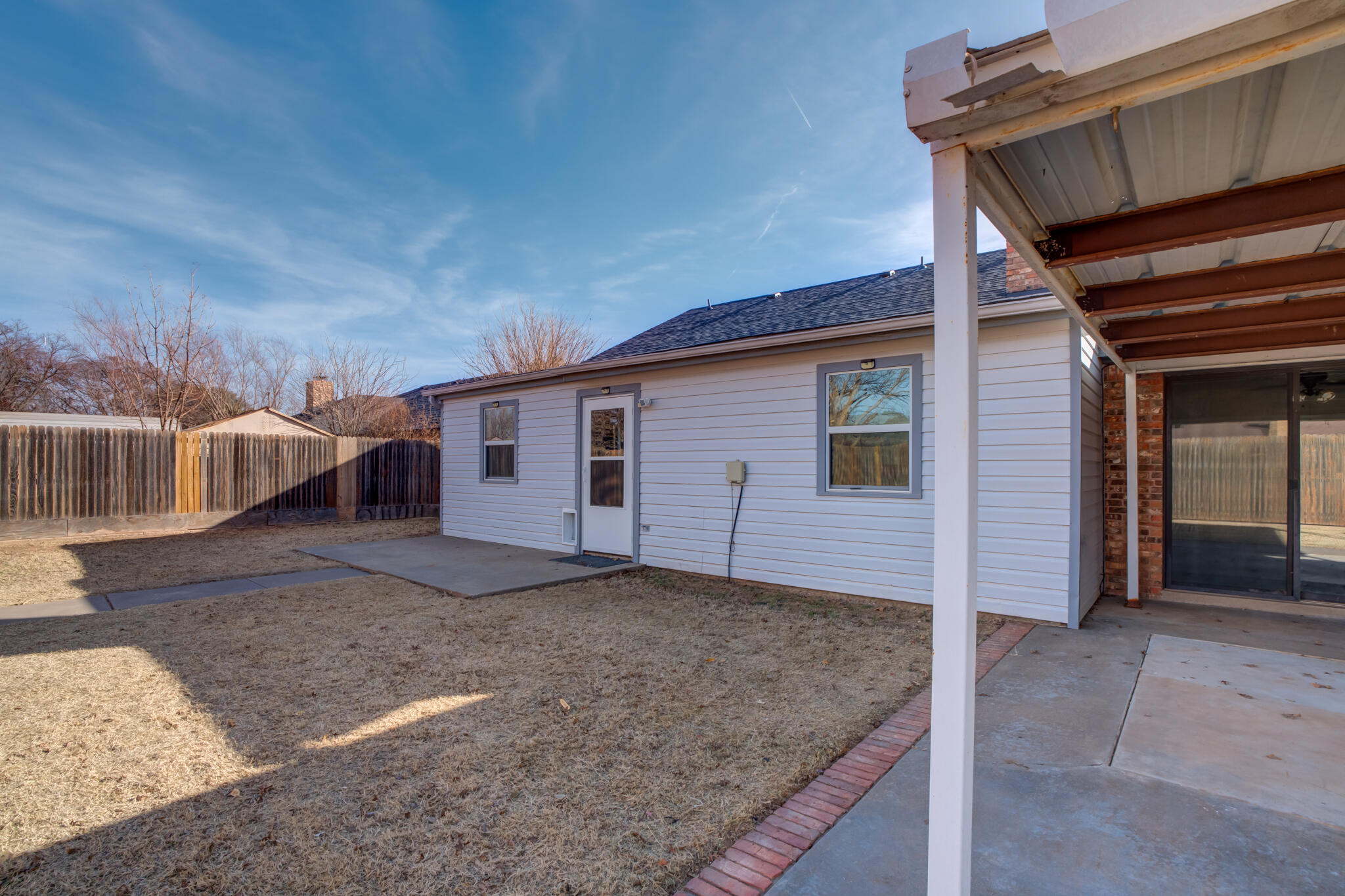 3602 101st Street Lubbock, TX 79423 - Photo 48 of 51 a view of a house with a backyard