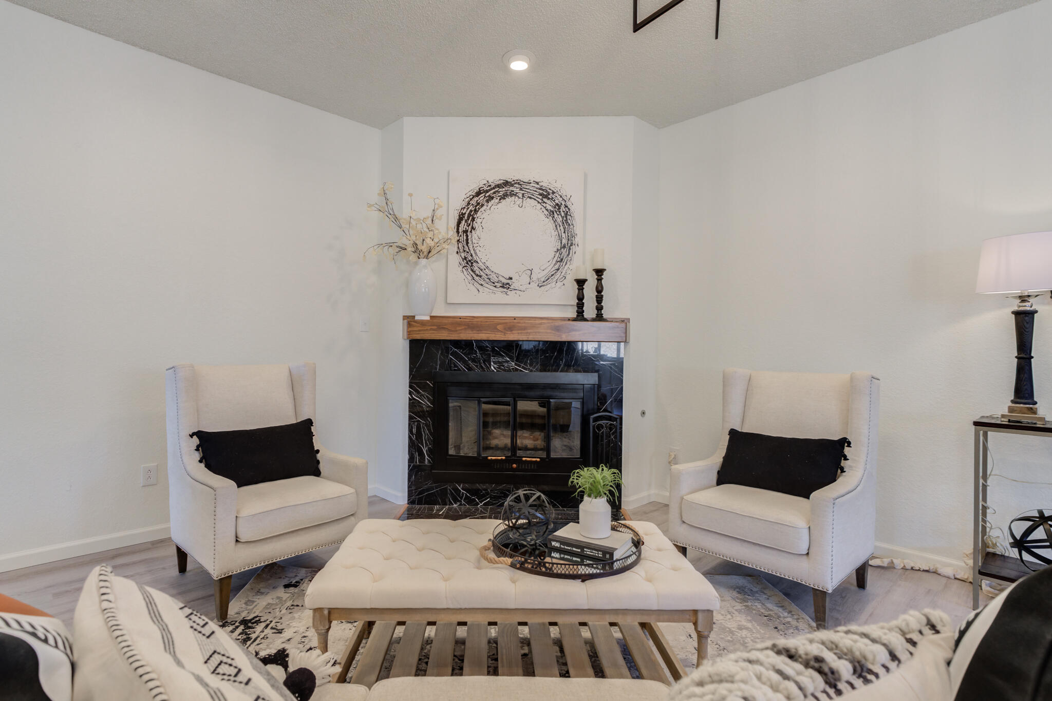 3602 101st Street Lubbock, TX 79423 - Photo 6 of 51 a living room with furniture and a fireplace