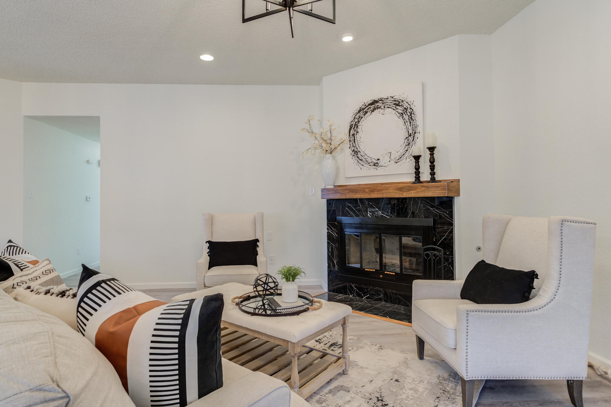 3602 101st Street Lubbock, TX 79423 - Photo 7 of 51 a living room with furniture and a fireplace