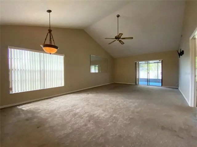 a view of empty room with windows