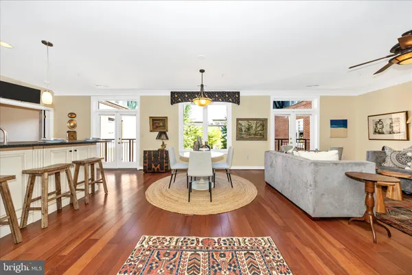 a kitchen with appliances cabinets and furniture