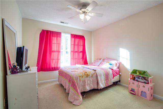 764 Hunters Crossing Lane Springfield, TN 37172 - Photo 13 of 17 Secondary bedrooms are located at the front of the house. Each have double closets and great space.