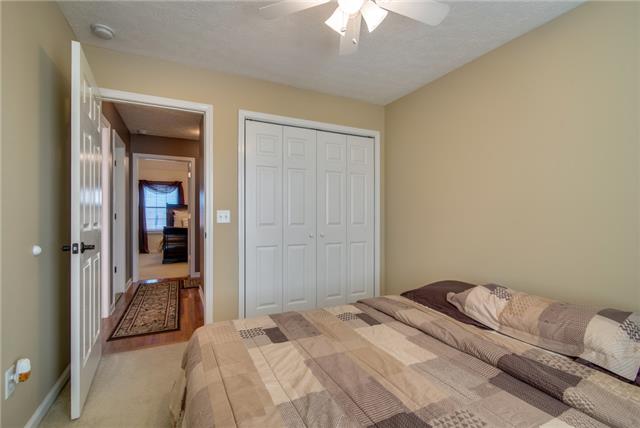 764 Hunters Crossing Lane Springfield, TN 37172 - Photo 14 of 17 The other secondary bedroom. This view also shows the nice hardwood floors in the hallway.
