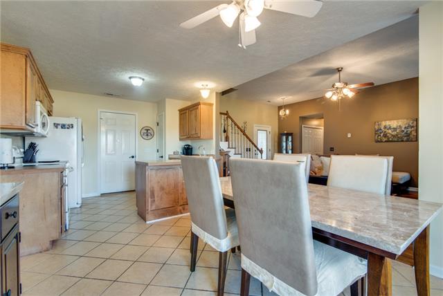 The photo really showcases the kitchen and how it opens to the living area.  