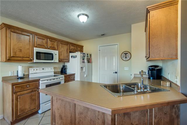 Everything is at your finger tips in this kitchen.  Plus you are still a part of the action whether it be at the kitchen table or in the living room.