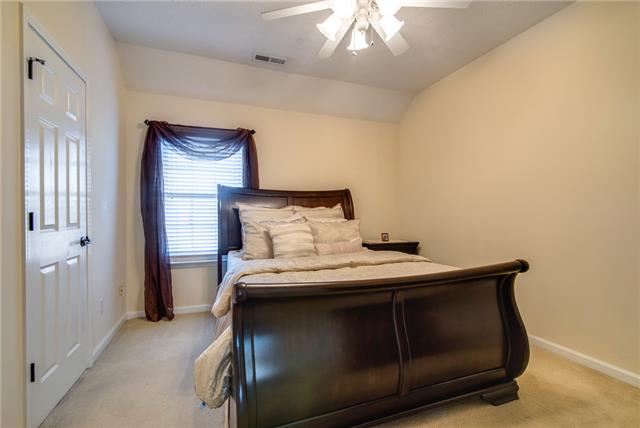 764 Hunters Crossing Lane Springfield, TN 37172 - Photo 9 of 17 Master bedroom is very cozy and comfortable. Large walk in closet and ceiling fan is a great feature to this room.