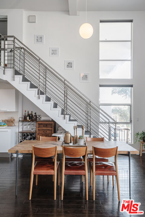13326 Beach Avenue, Unit 202 Marina del Rey, CA 90292 - Photo 5 of 17 a dining room with furniture window and wooden floor