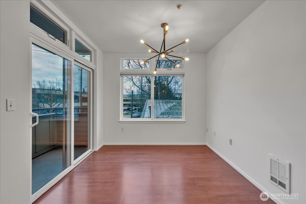 18 Dravus Street, Unit 207 Seattle, WA 98109 - Photo 15 of 34 a view of an empty room with a window