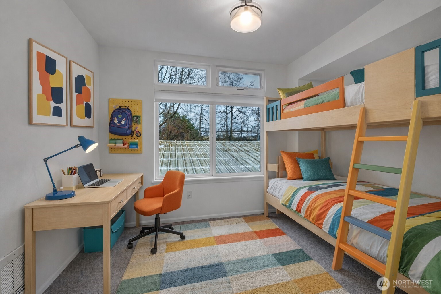 18 Dravus Street, Unit 207 Seattle, WA 98109 - Photo 21 of 34 a bedroom with furniture and a window