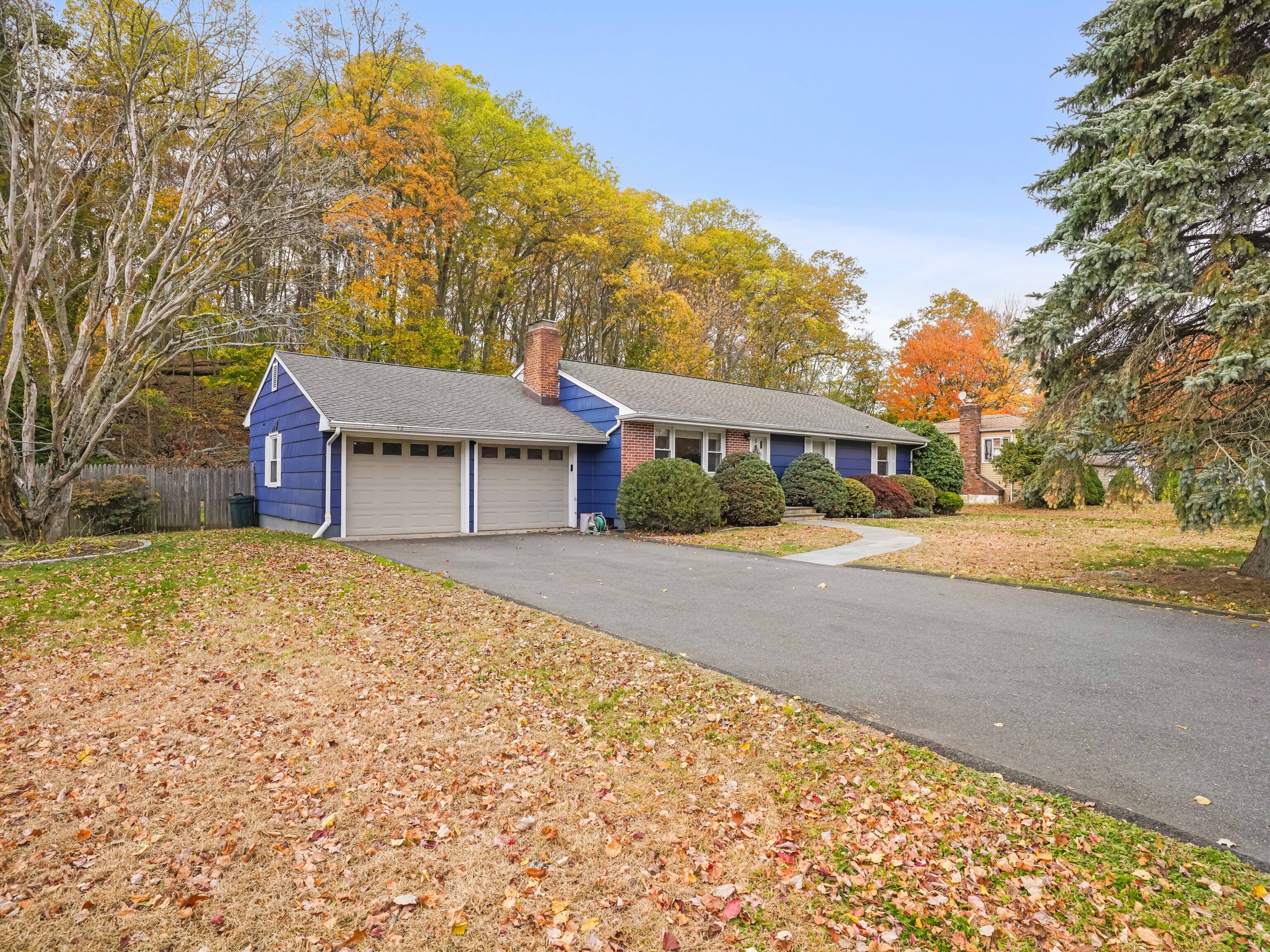 5 Maher Drive Norwalk, CT 06850 - Photo 1 of 36 a front view of a house with a yard and mountain view
