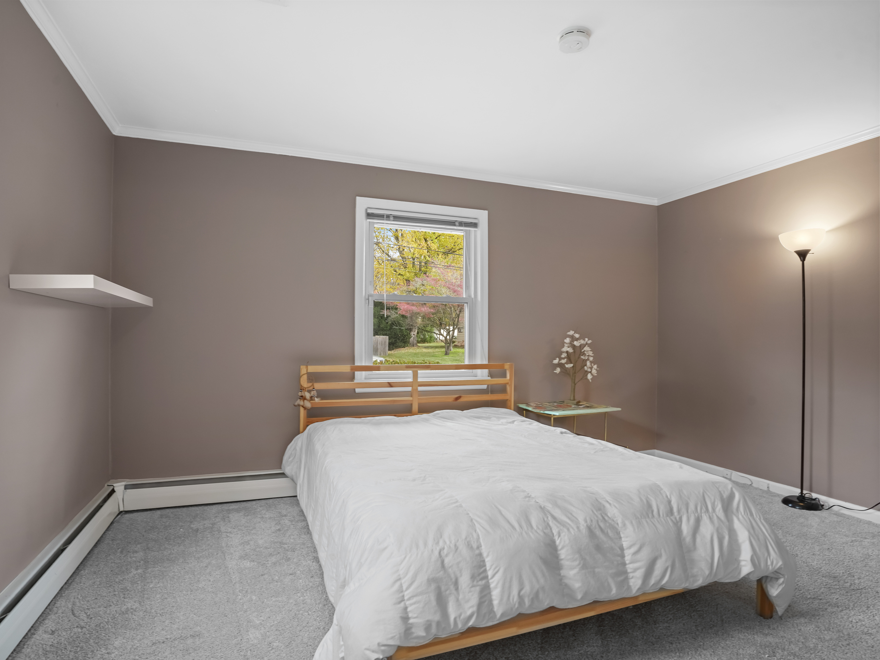 5 Maher Drive Norwalk, CT 06850 - Photo 19 of 36 a bedroom with a bed and window