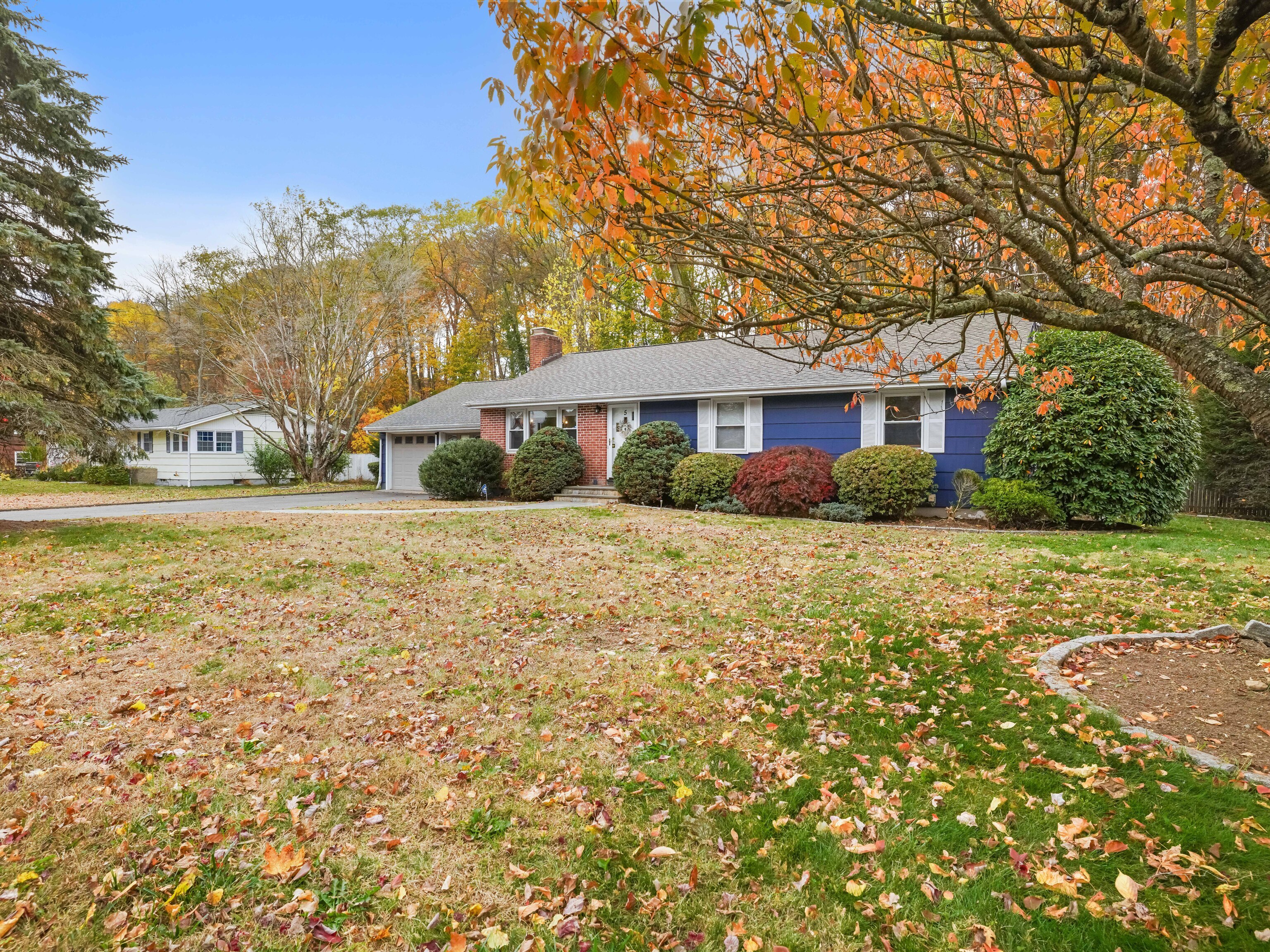 5 Maher Drive Norwalk, CT 06850 - Photo 2 of 36 a front view of house with yard and green space