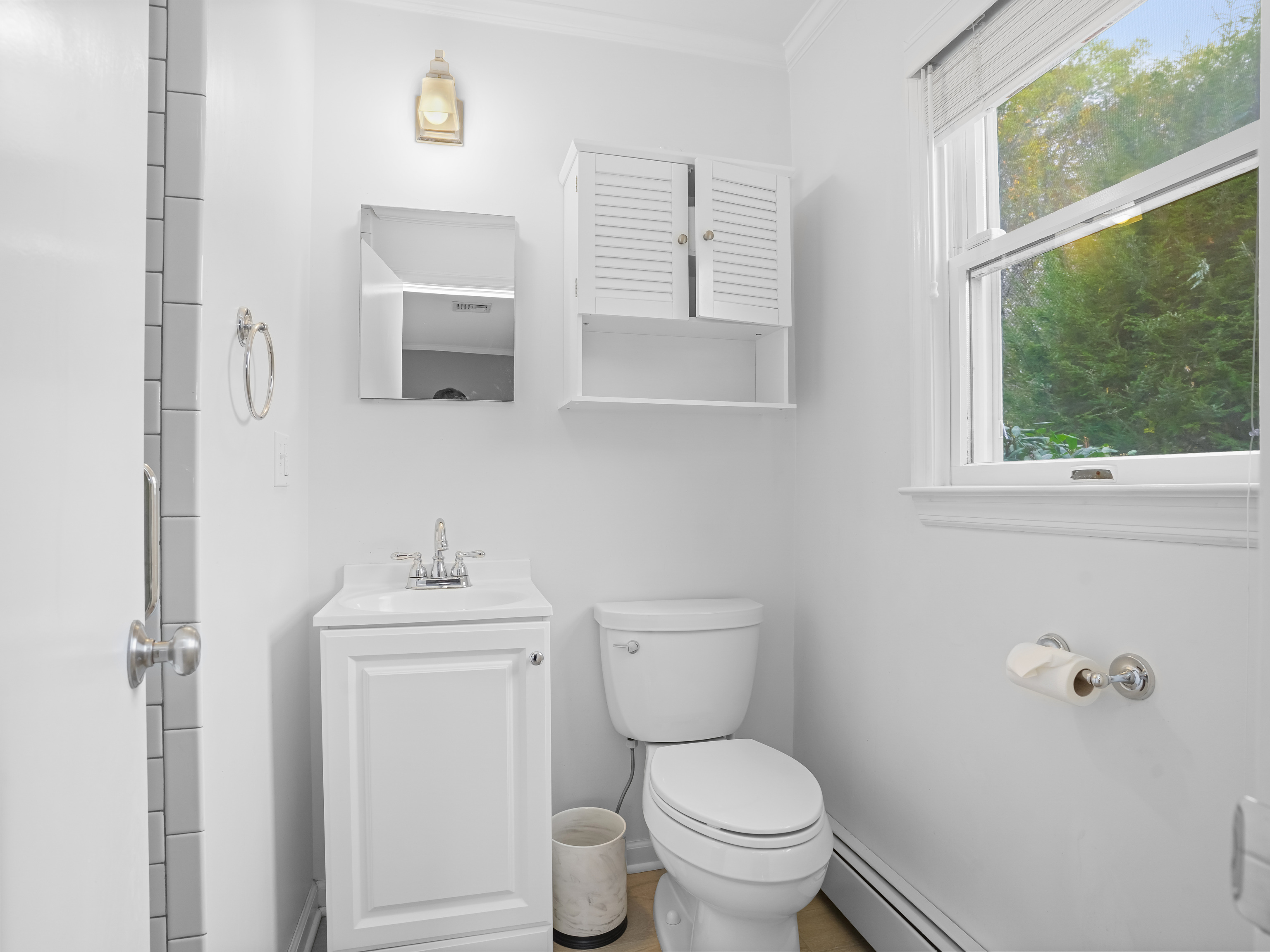 5 Maher Drive Norwalk, CT 06850 - Photo 21 of 36 a bathroom with a toilet a sink and a window