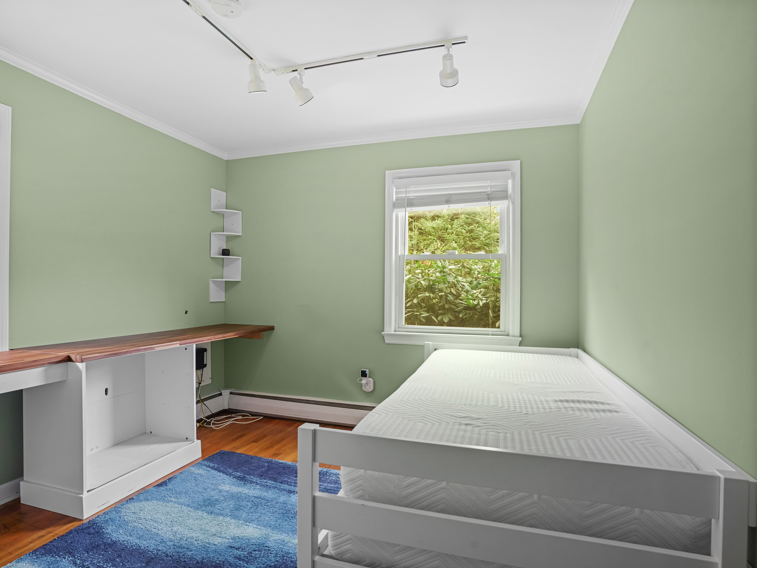 5 Maher Drive Norwalk, CT 06850 - Photo 23 of 36 a bedroom with a bed and a window