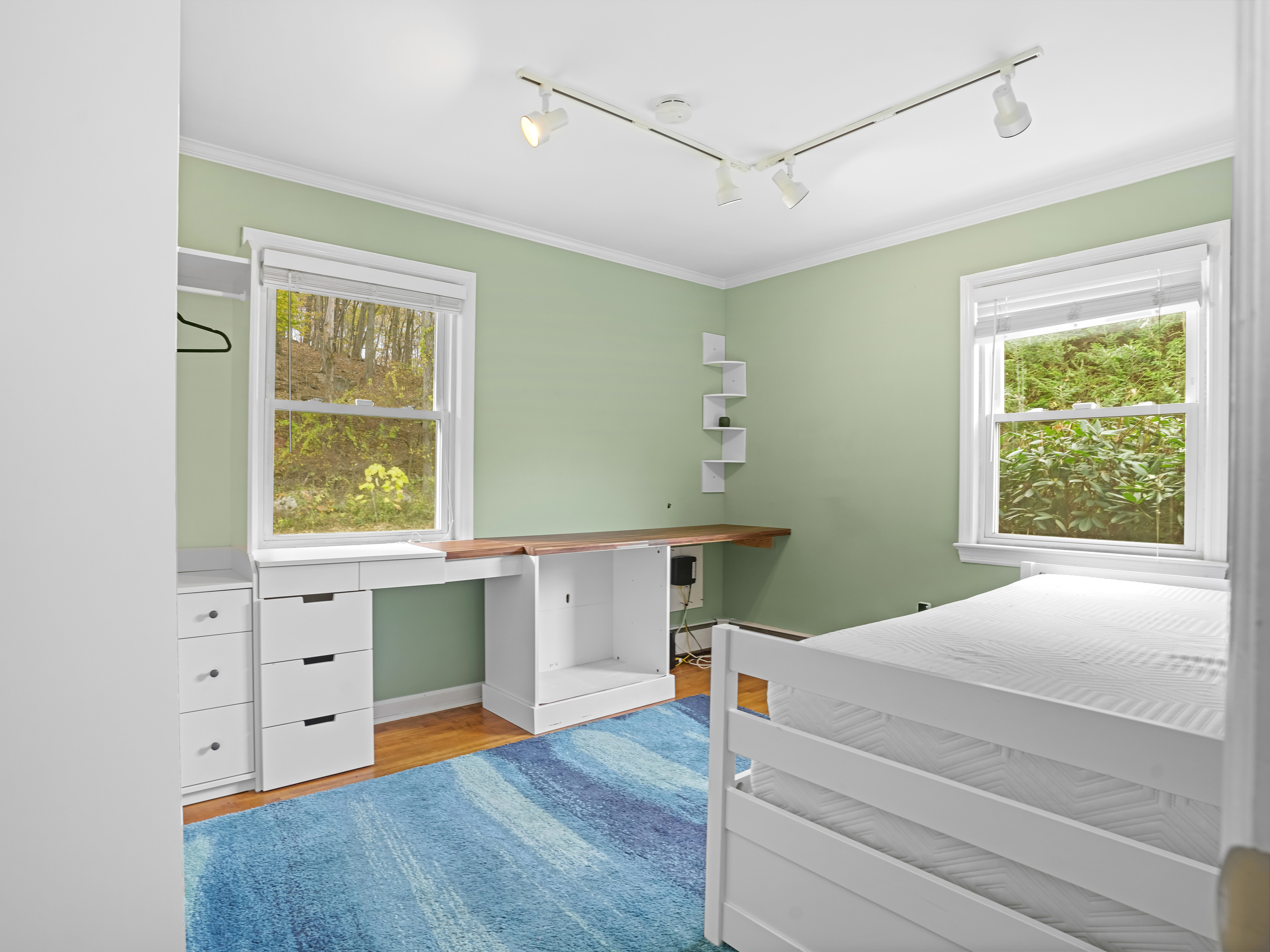 5 Maher Drive Norwalk, CT 06850 - Photo 24 of 36 a room with window and cabinet