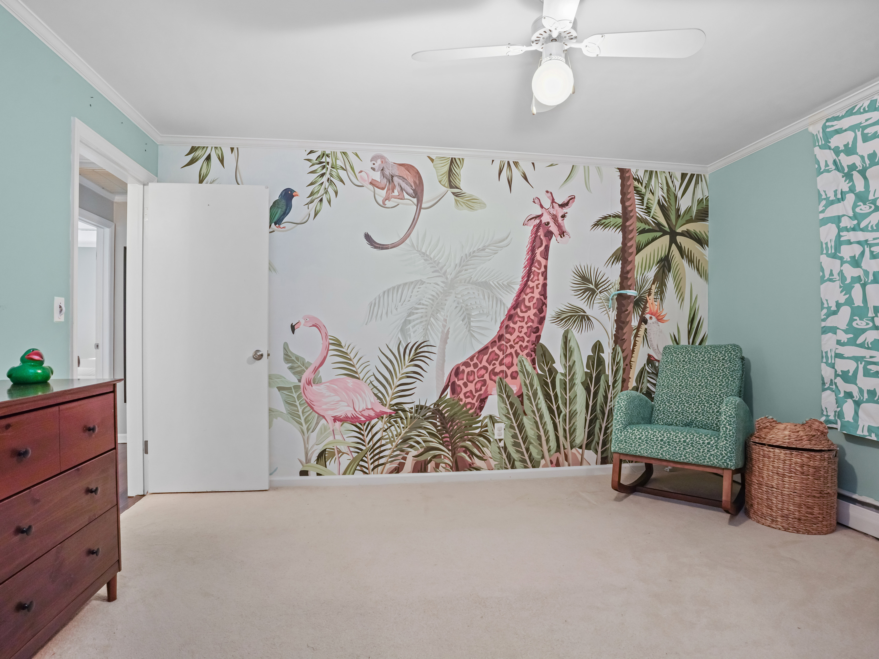 5 Maher Drive Norwalk, CT 06850 - Photo 26 of 36 a bedroom with a bed and a painting on the wall