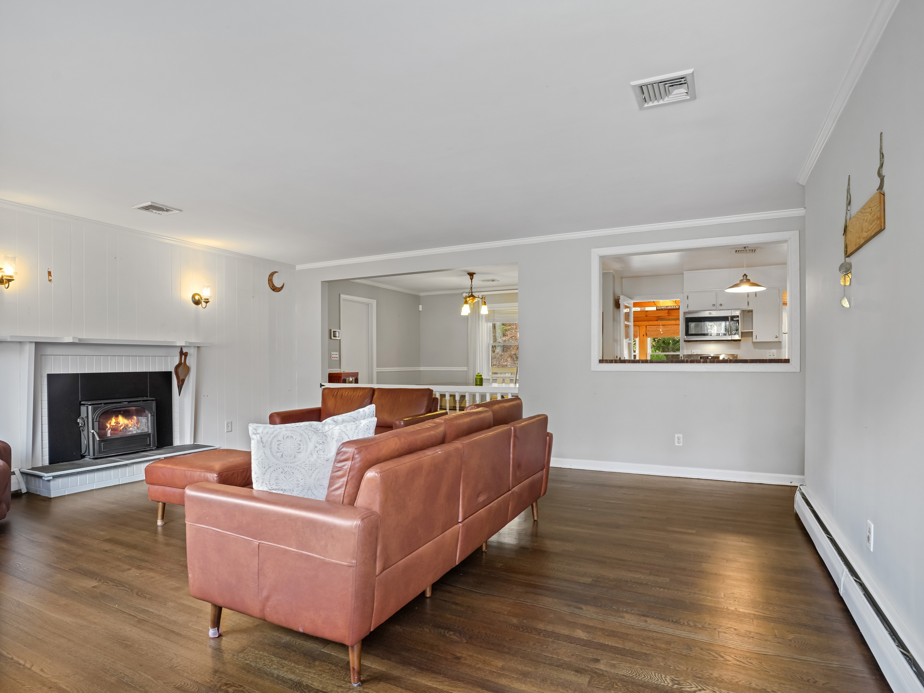 5 Maher Drive Norwalk, CT 06850 - Photo 3 of 36 a living room with furniture and a fireplace