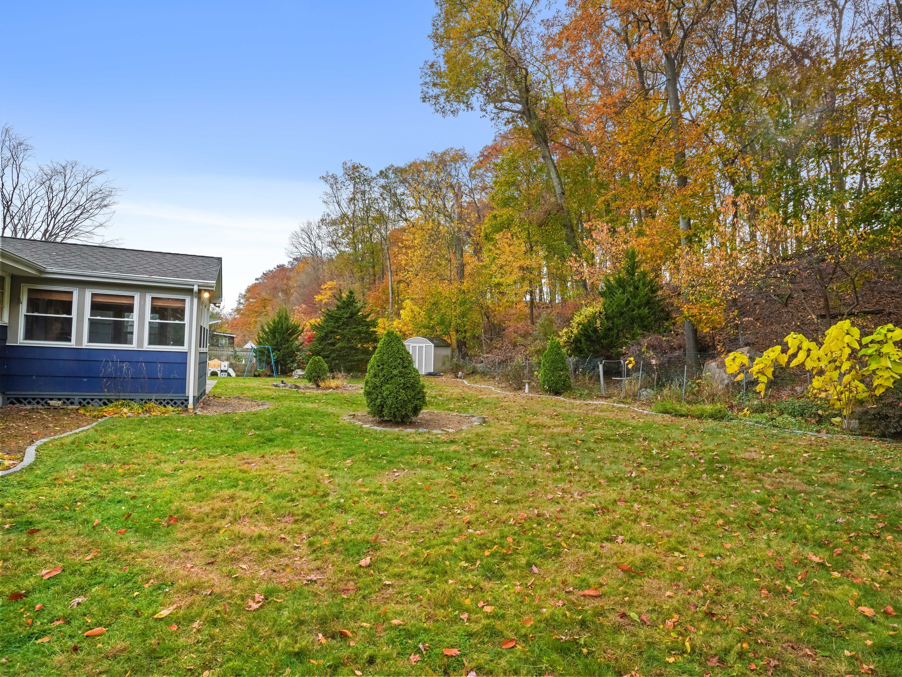 5 Maher Drive Norwalk, CT 06850 - Photo 35 of 36 a view of a house with a yard