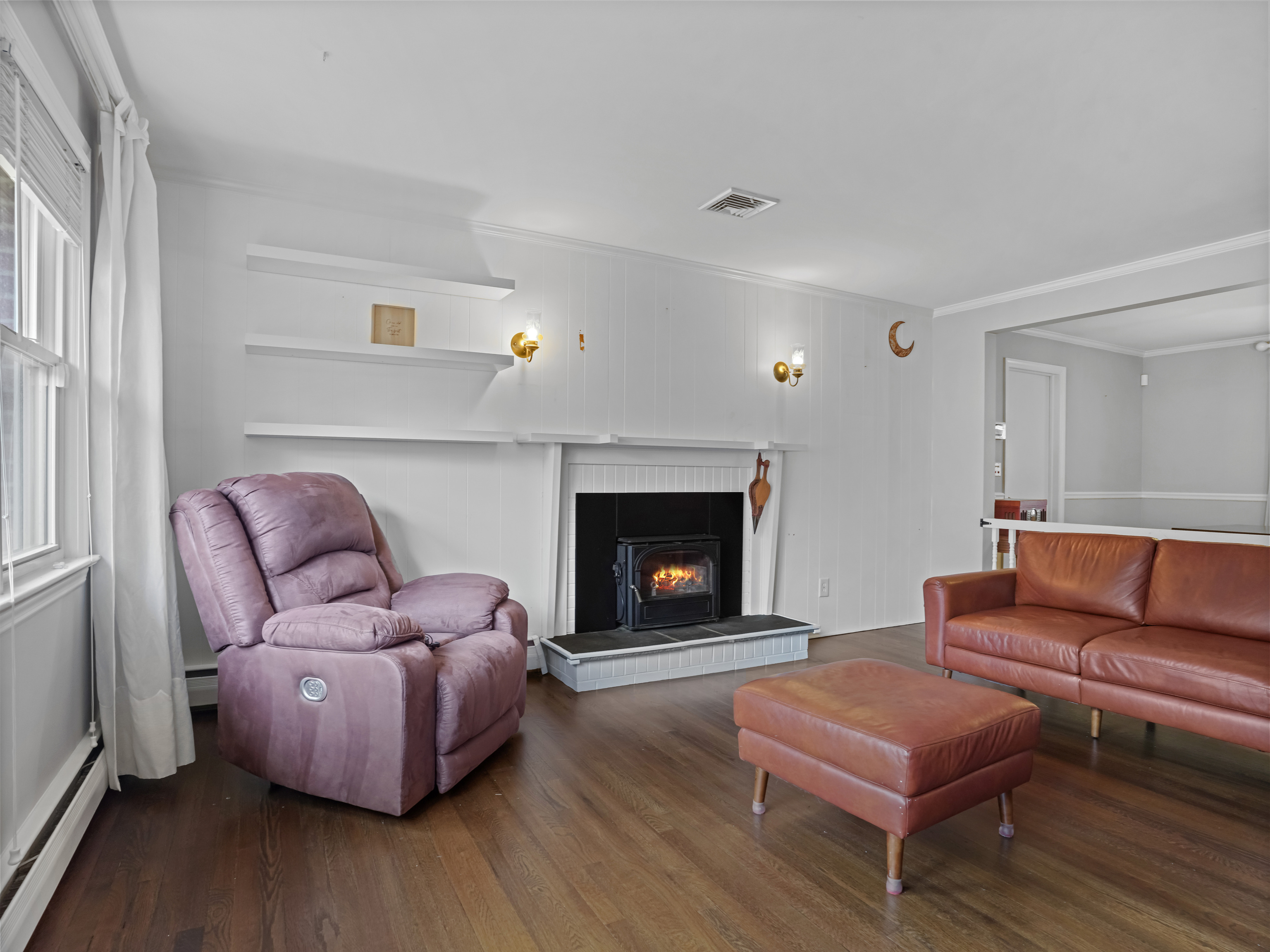 5 Maher Drive Norwalk, CT 06850 - Photo 5 of 36 a living room with furniture and a fireplace
