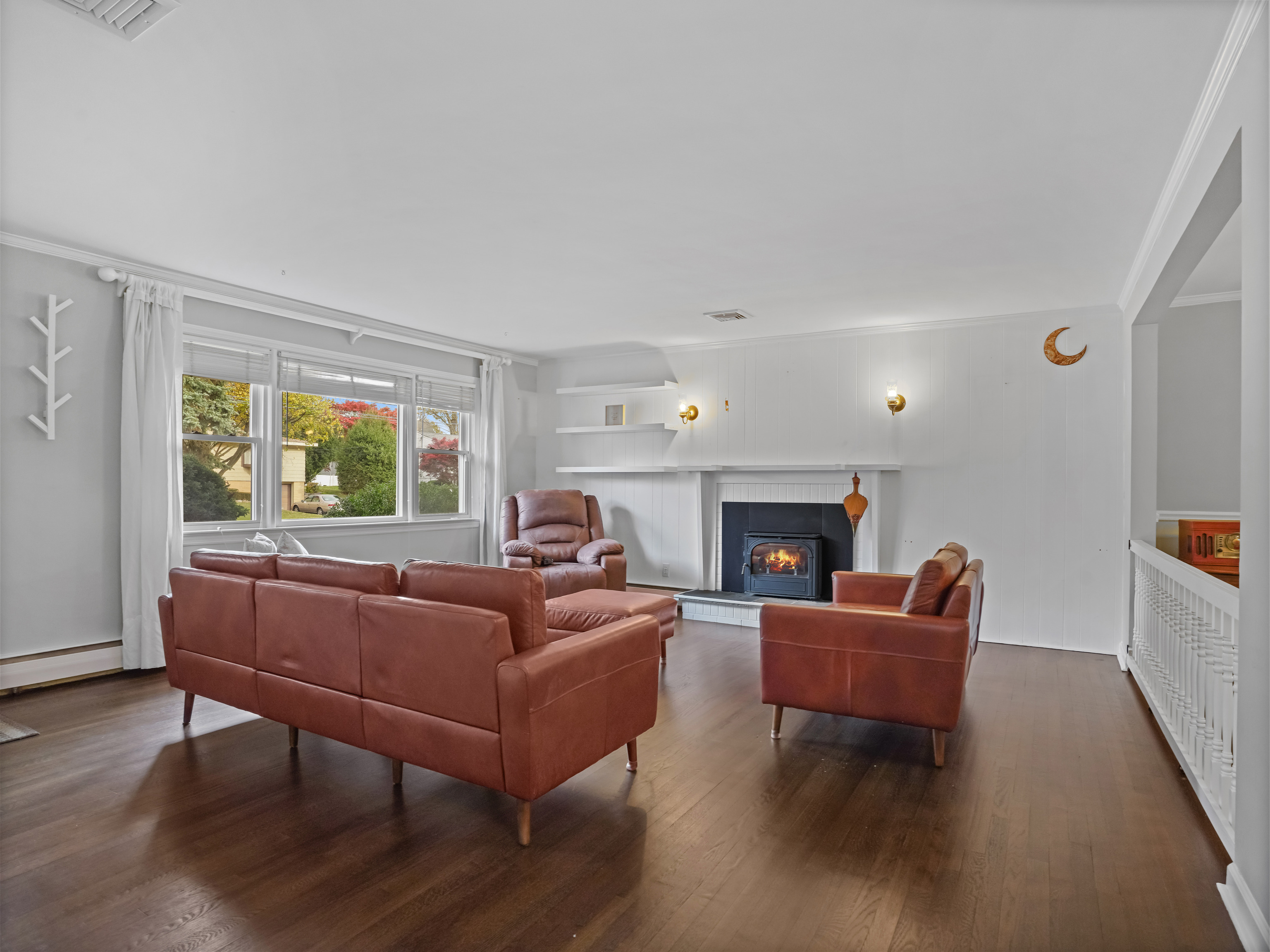 5 Maher Drive Norwalk, CT 06850 - Photo 7 of 36 a living room with furniture and a fireplace