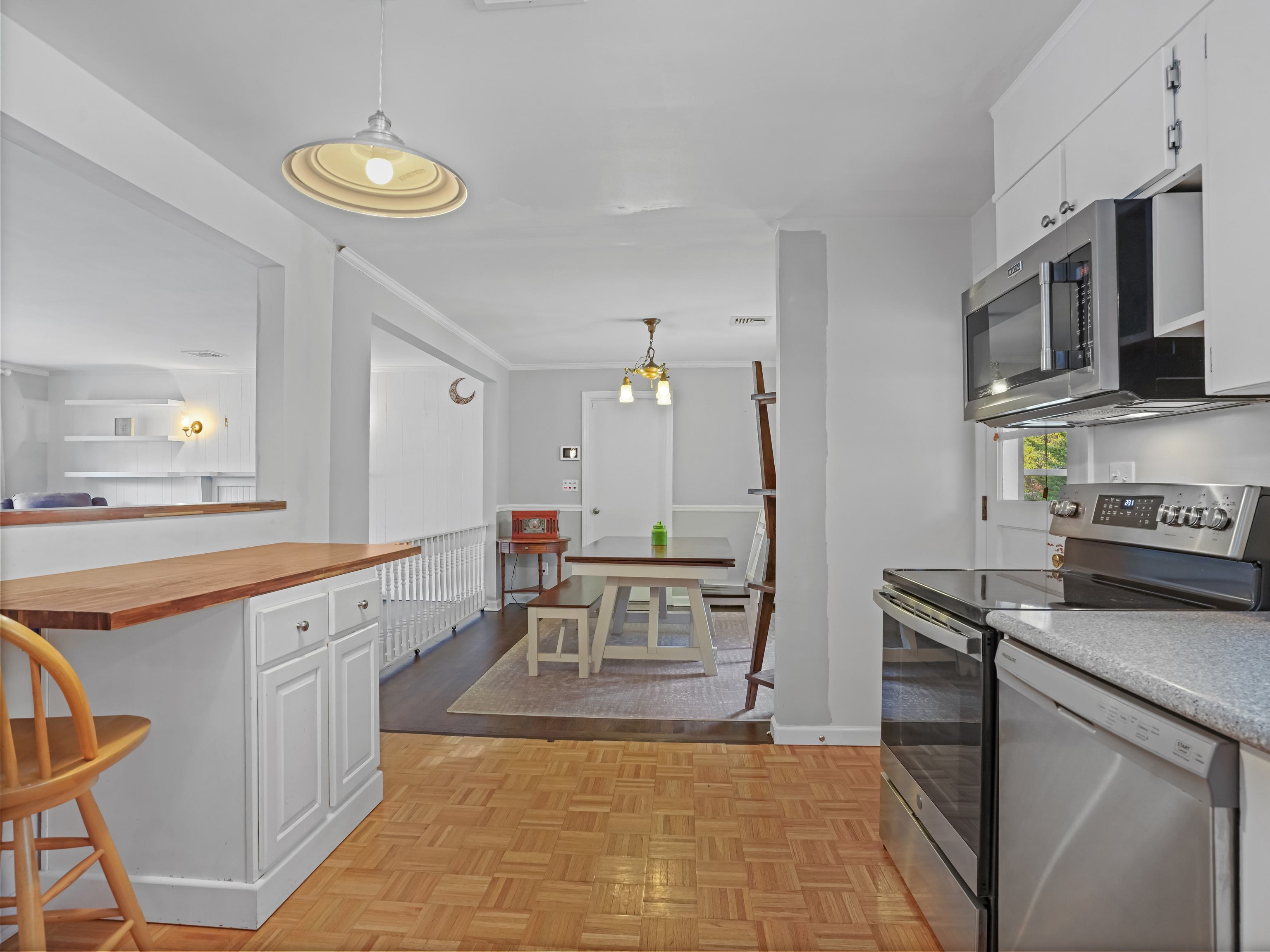 5 Maher Drive Norwalk, CT 06850 - Photo 10 of 36 a kitchen with stainless steel appliances granite countertop a sink stove and refrigerator