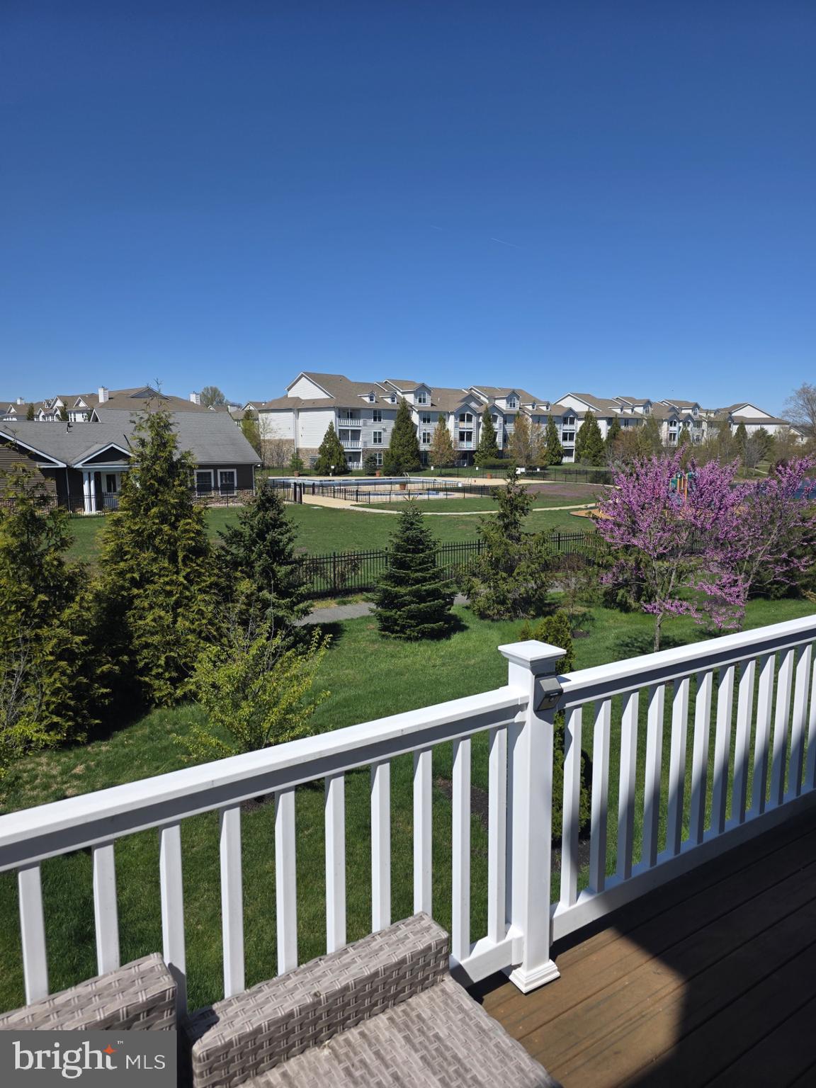 636 Rigel Way Bear, DE 19701 - Photo 10 of 25 Club House view from the deck with a pool view