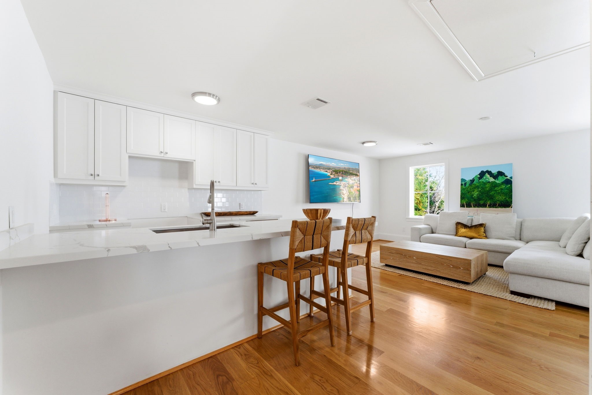 2211 Troon Road Houston, TX 77019 - Photo 42 of 44 a kitchen with stainless steel appliances granite countertop a stove top oven a sink dishwasher a dining table and chairs with wooden floor