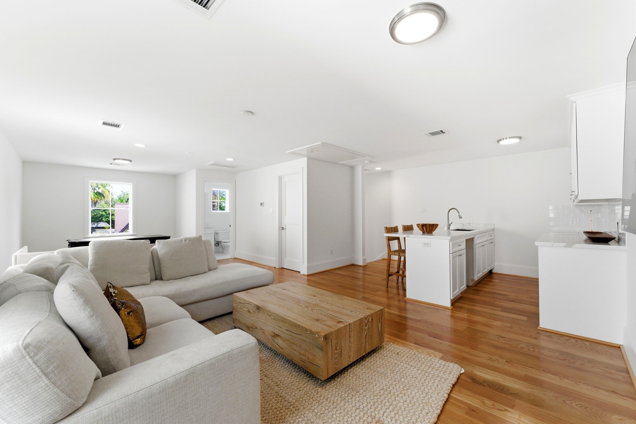 2211 Troon Road Houston, TX 77019 - Photo 43 of 44 a living room with furniture and a wooden floor