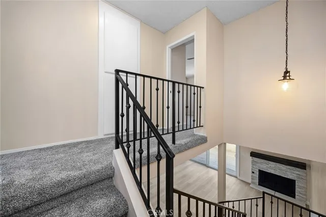 a bathroom with a shower a toilet and a sink