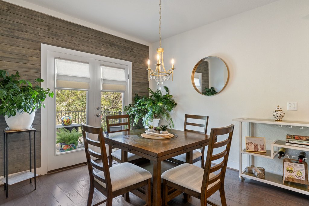 7409 Merrick Lane, Unit 40 Austin, TX 78745 - Photo 11 of 37 a dining room with furniture and window