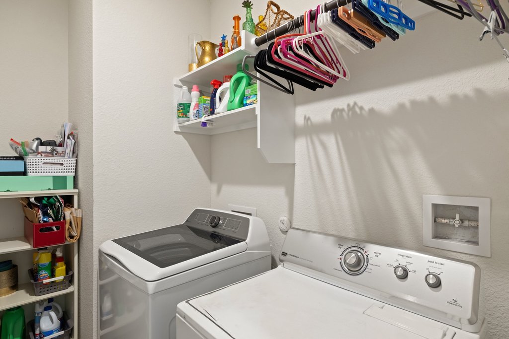 7409 Merrick Lane, Unit 40 Austin, TX 78745 - Photo 19 of 37 a utility room with dryer and washer
