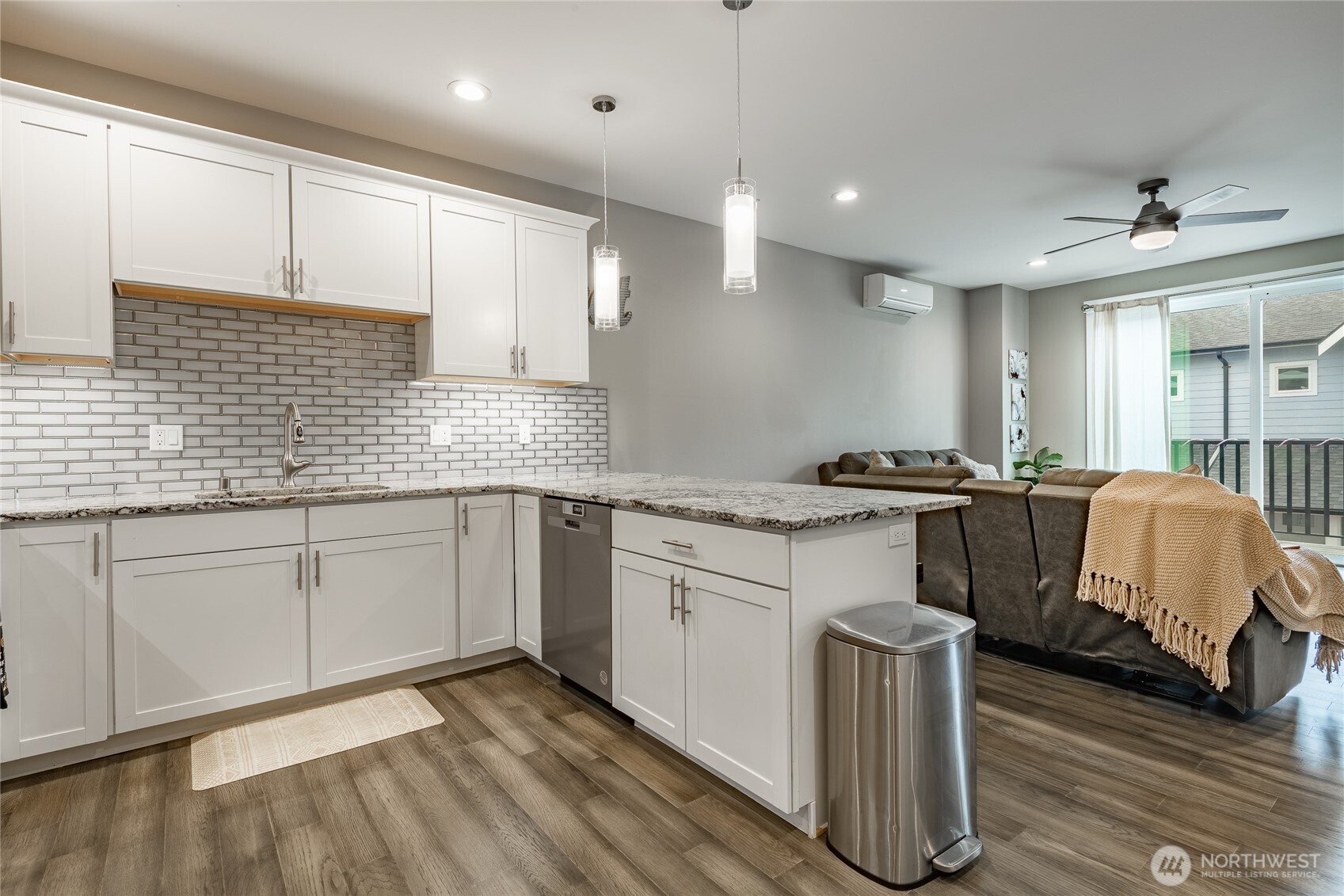 5682 Sunstone Place, Unit 103 Ferndale, WA 98248 - Photo 11 of 30 a kitchen with a sink cabinets and window