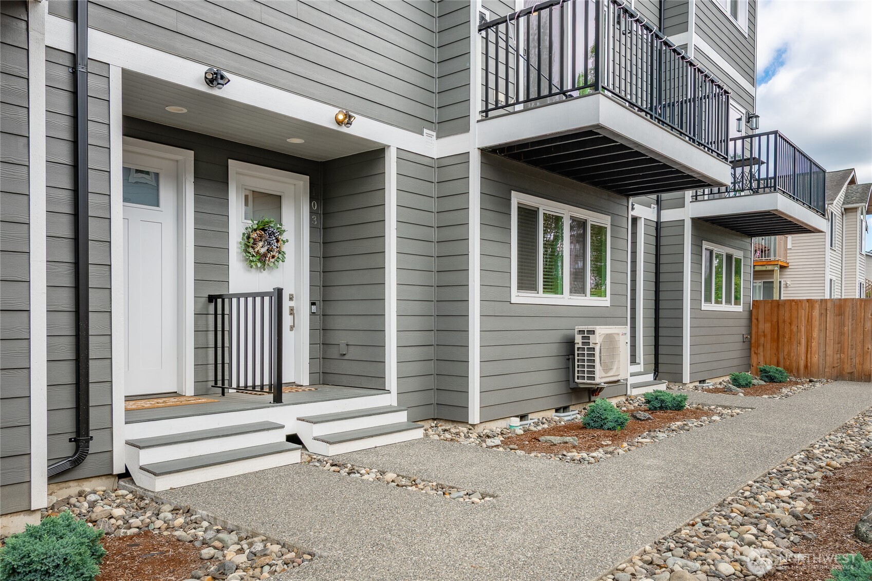 5682 Sunstone Place, Unit 103 Ferndale, WA 98248 - Photo 2 of 30 a front view of a house