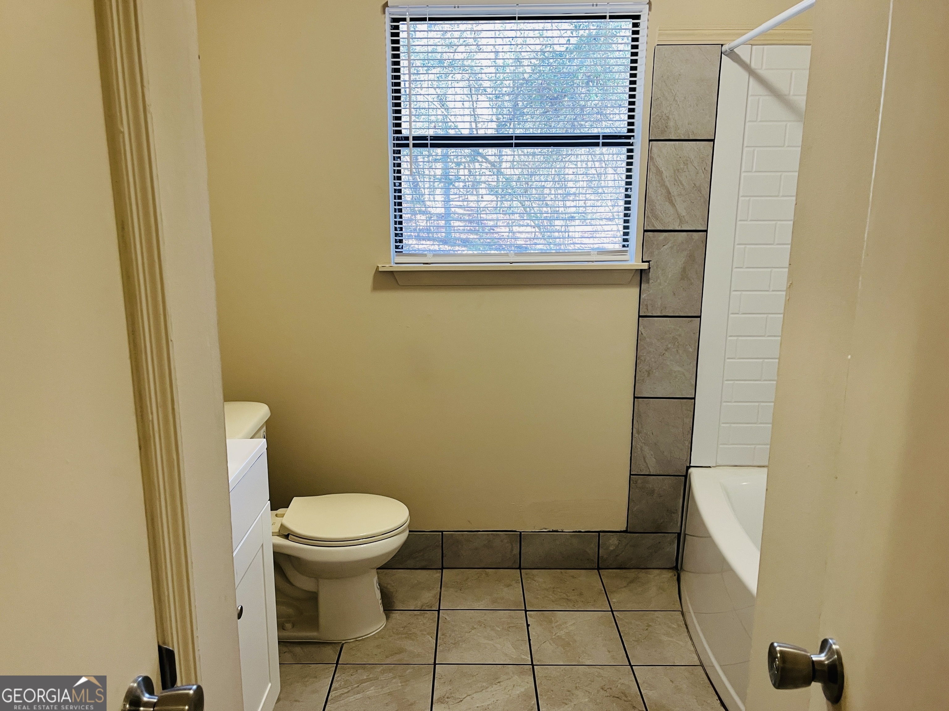 4120 Midway Road, Unit 4120 Douglasville, GA 30134 - Photo 18 of 24 a bathroom with a toilet