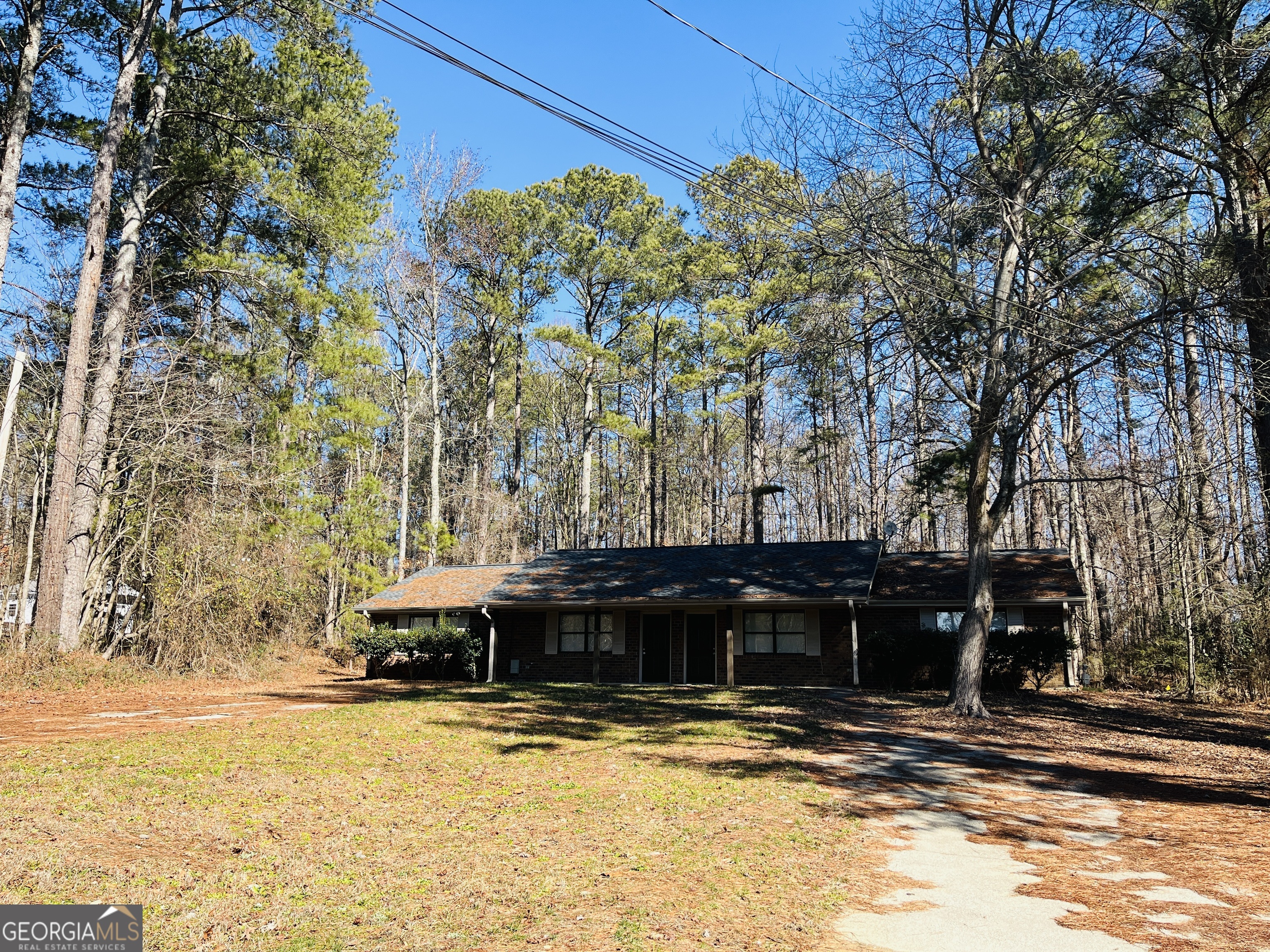 4120 Midway Road, Unit 4120 Douglasville, GA 30134 - Photo 24 of 24 a view of a house with a yard