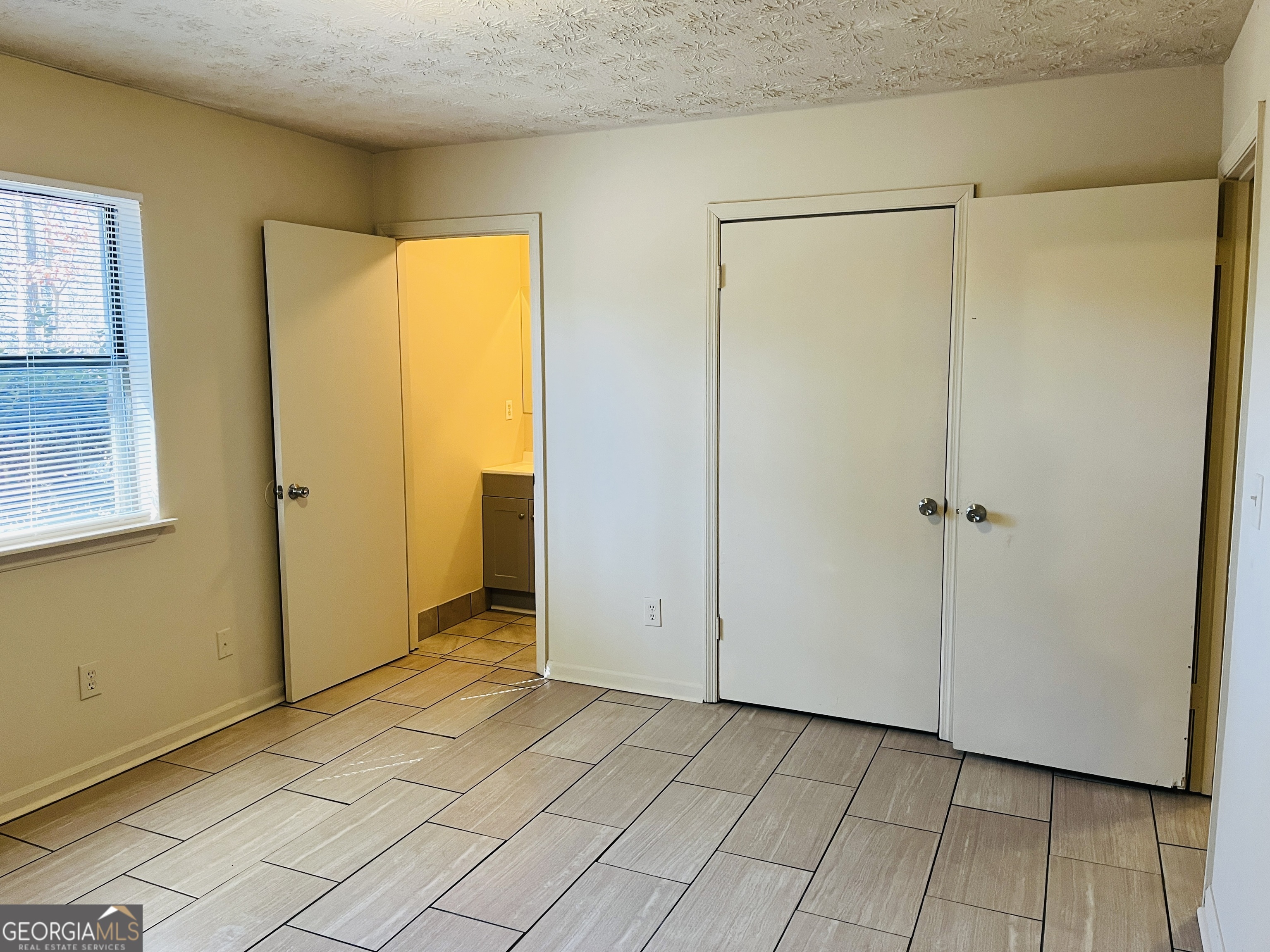 4120 Midway Road, Unit 4120 Douglasville, GA 30134 - Photo 10 of 24 a view of a room with an empty room