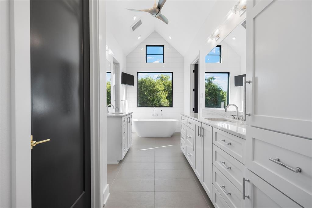 477 Wolf Creek Road Lorena, TX 76655 - Photo 19 of 40 a bathroom with a granite countertop sink and mirror
