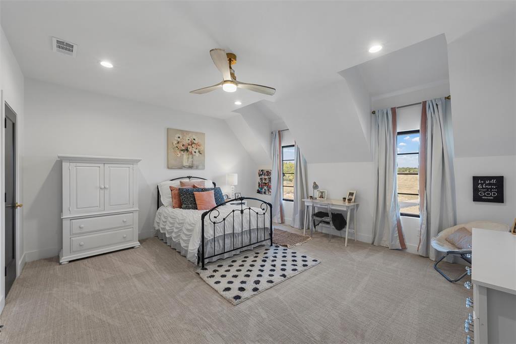 477 Wolf Creek Road Lorena, TX 76655 - Photo 21 of 40 a bedroom with furniture and window