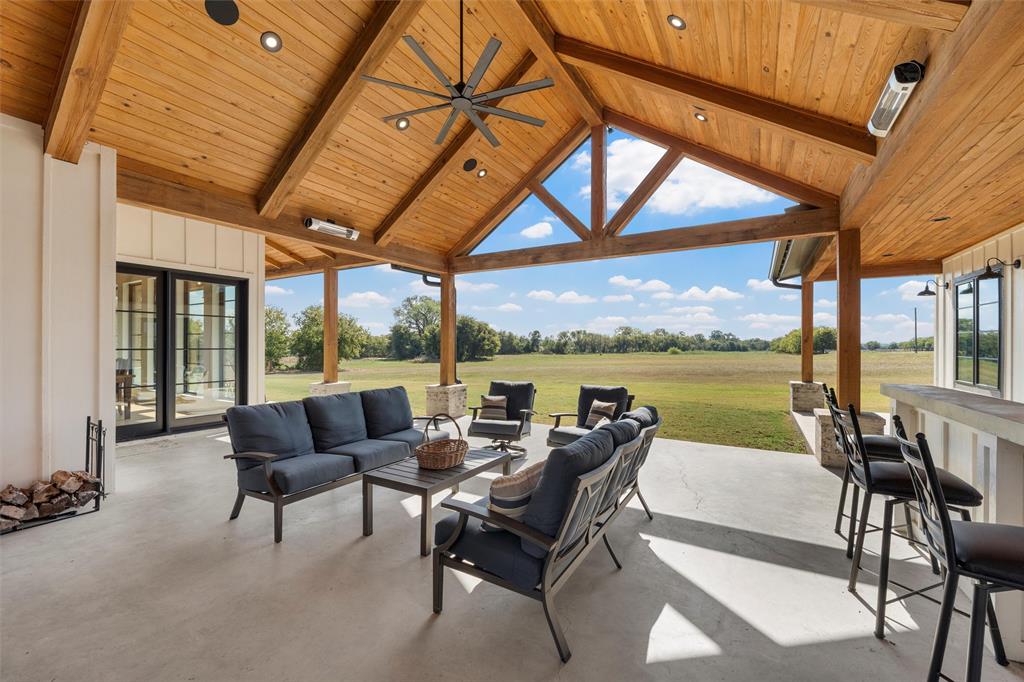 477 Wolf Creek Road Lorena, TX 76655 - Photo 22 of 40 a living room with furniture and outdoor space
