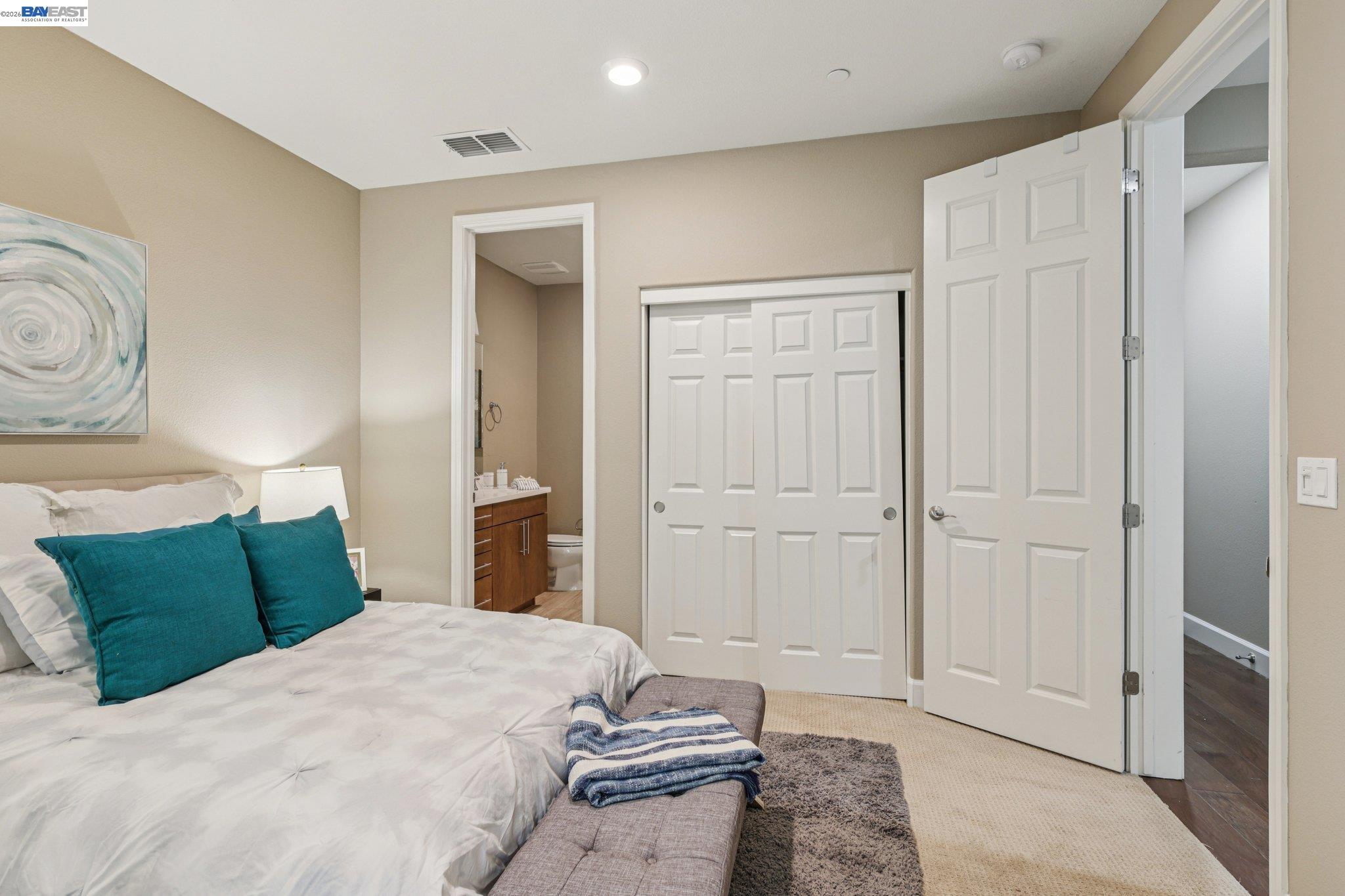 4022 Windsor Way Dublin, CA 94568 - Photo 14 of 55 a bedroom with a bed and a mirror
