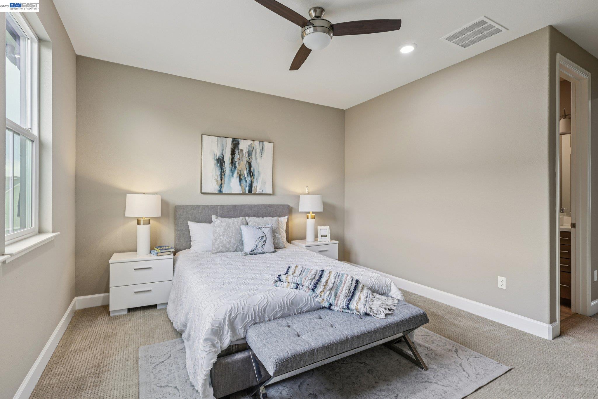 4022 Windsor Way Dublin, CA 94568 - Photo 20 of 55 a bedroom with a bed and a painting on the wall