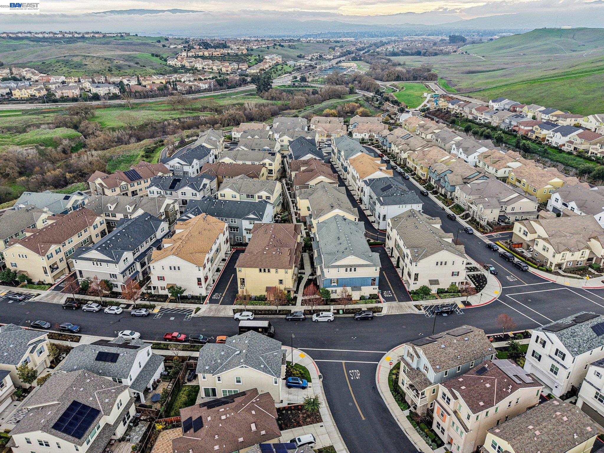 4022 Windsor Way Dublin, CA 94568 - Photo 24 of 55 an aerial view of a city with lots of residential buildings