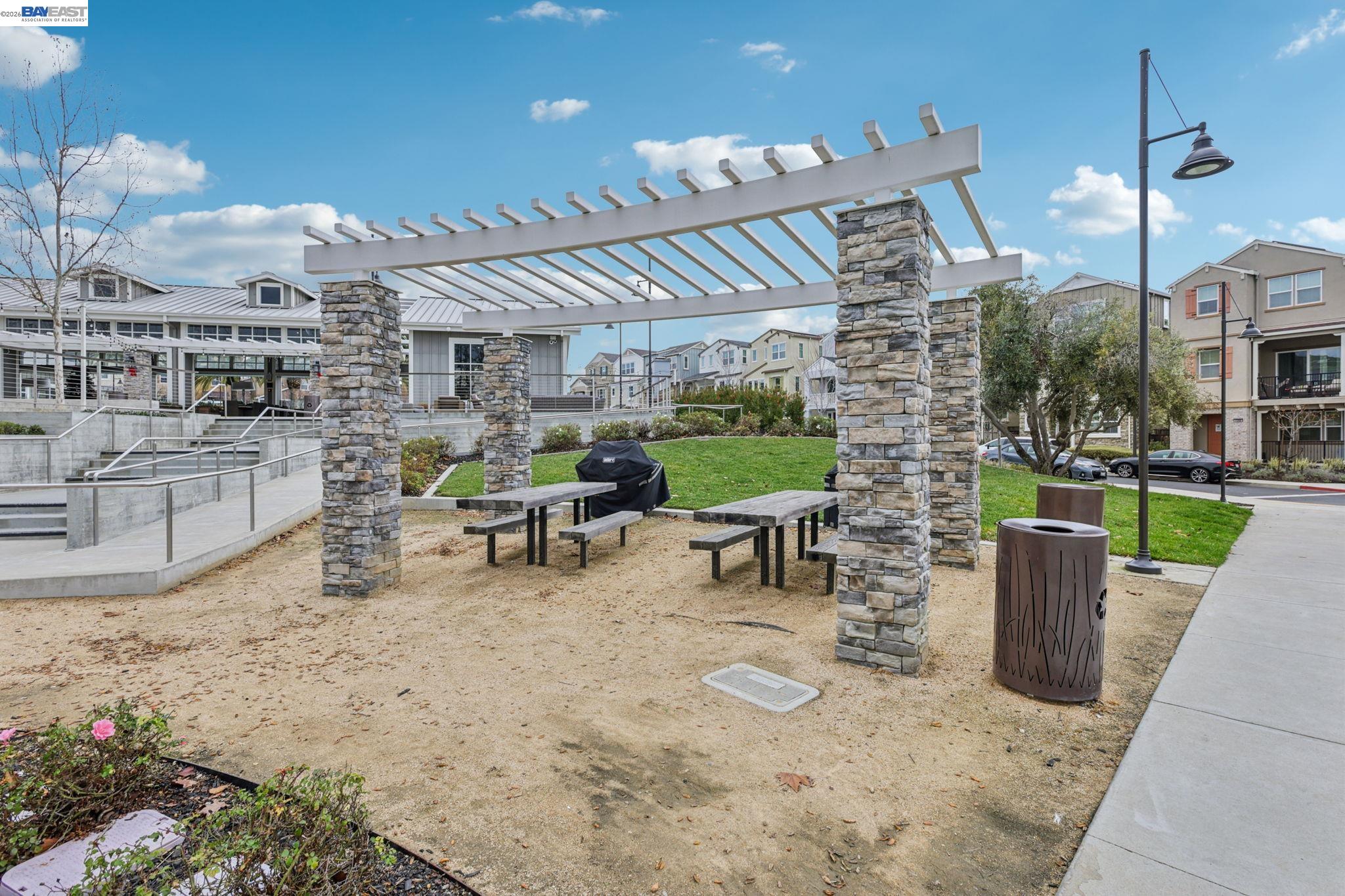 4022 Windsor Way Dublin, CA 94568 - Photo 35 of 55 a view of a patio with a table and chairs
